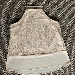 Cream colored tank top with embroidered detailing